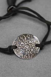 Close up of fine silver medallion 05/24/2012